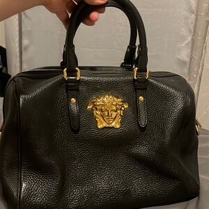 Versace leather black purse! Make me an offer 😍willing to go $700